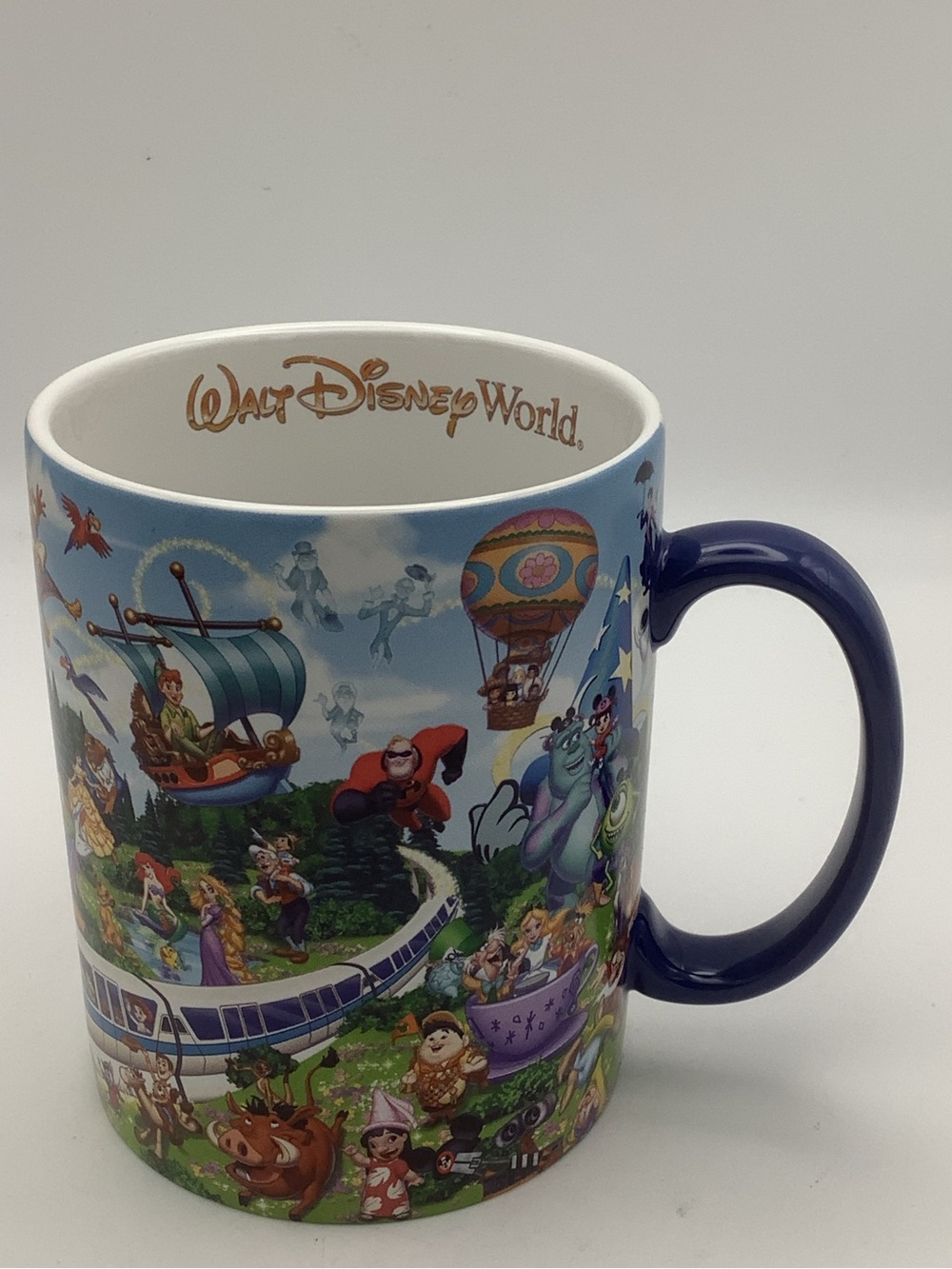 Walt Disney World Character Collage Mug - Blue Handle